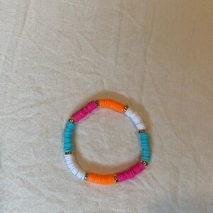 A handmade clay bead bracelet